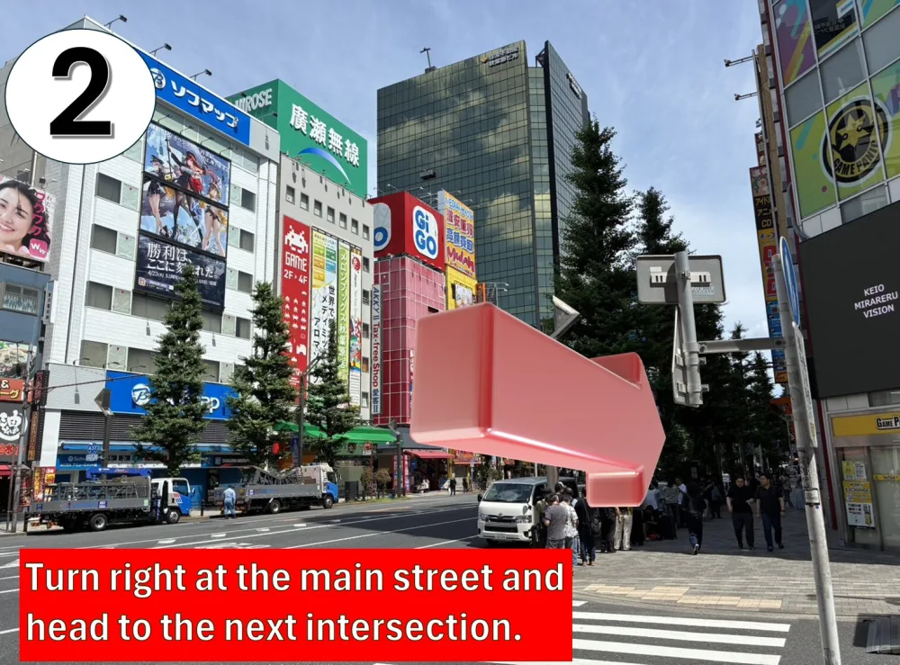 Step 2: Turn right onto the main street and continue to the next intersection.